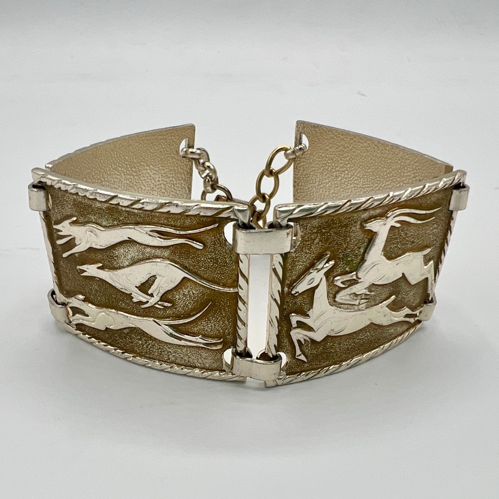 SOLD- Vintage silver & gold bracelet depicting jaguars hunting deer—unique!